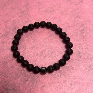 Hand crafted black lava rock bracelet w/ gunmetal accent.-FREE gift w/ purchase